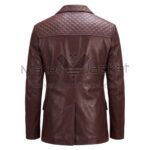 The back view of Maroon Quilted Leather Blazer showcasing a diamond-quilted shoulder yoke, tailored seams, and a single center vent at the hem.