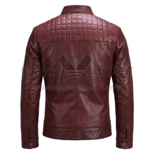 back view of Maroon Quilted Paneled Cafe Racer Leather Jacket a square-quilted upper back panel, a band collar, a center seam, and snap-button cuffs.