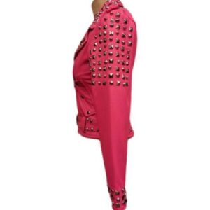 Side profile of women’s golden studded pink moto jacket