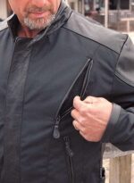 Close-up of rugged leather texture on men’s riding jacket
