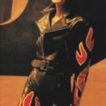 Rider wearing vintage flame design motorcycle jacket
