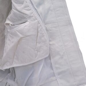 Close of black stripe on white leather jacket