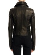 Back view of women’s black leather moto jacket with bold seams and fit
