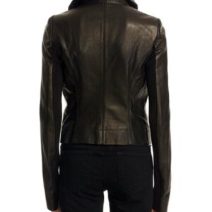Back view of women’s black leather moto jacket with bold seams and fit