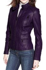 Front view of women's purple quilted biker jacket with zipper closure and lapel collar