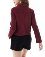 back of leather texture and zipper details on maroon biker jacket