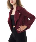 Model wearing maroon moto biker jacket styled with black pants