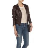 Model in Flora leather biker jacket paired with denim jeans