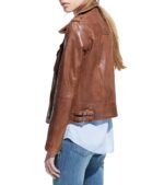 Flat lay of Stella brown leather biker jacket showing inner lining and fine stitching