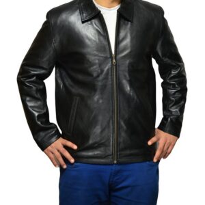 Model in Diego black jacket styled with jeans and boots in urban setting