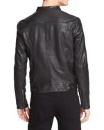 Model wearing Kevin leather biker jacket styled with dark denim