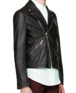 Side profile of Pearl black jacket showing sculpted shoulders and sleek sleeves