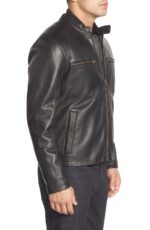 Side of smooth black leather and stitching on Robbie jacket