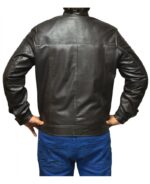 Model wearing Titan-inspired black leather jacket with bold masculine fit