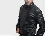 Man wearing Phantom motorcycle black leather jacket with aggressive biker styling