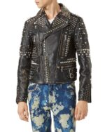 Man wearing studded leather biker jacket with zip pockets and sharp collar design
