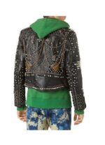 back view of biker-style leather jacket featuring studded shoulders and metal hardware