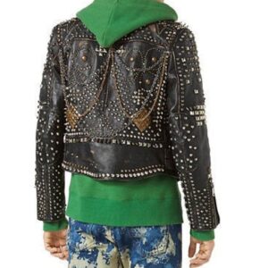back view of biker-style leather jacket featuring studded shoulders and metal hardware