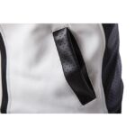 Men’s black and white faux leather moto jacket with stand-up collar and stylish zipper.
