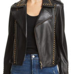 Women’s steampunk-inspired biker leather jacket with studded detailing and edgy design.