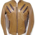 Men’s brown leather cafe racer jacket with front zipper and snap-tab collar for a classic biker look.