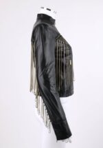 Black leather jacket with gold chain fringe on a mannequin, featuring a front zipper and standing collar for a bold, edgy style.