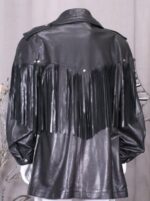 Fringed black moto coat combining biker edge with boho flair, perfect for standout street style.