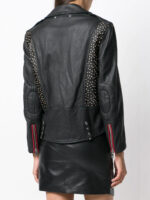Fashion-forward black leather jacket with mixed materials—leopard print, metal studs, and red hardware for standout street style.