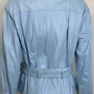 Light blue leather jacket with silver star-shaped zipper pulls, belt, and wide lapel for a modern, edgy look.
