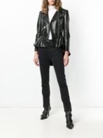Black fringed moto coat with long tassel details and classic biker silhouette for a bold, Western-inspired style.
