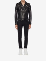 Edgy black biker jacket with skull-lined interior, silver zippers, and classic asymmetrical leather design.