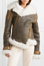Stylish women's shearling moto jacket with textured leather finish