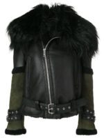 Black leather jacket with a woolly fur collar. It features an asymmetrical zipper, green sleeves, and belted accents for a bold, edgy look.