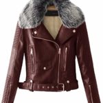 Maroon faux leather jacket with silver faux fur collar. Features zippered pockets, a belt, and quilted details on the sleeves. Stylish and warm.