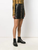 black-leather-buckled-mini-skirt