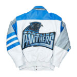 The NFL Carolina Panthers Jeff Hamilton Full Leather Jacket is a vintage white, blue, and gray leather jacket with the team logo and lettering on the back, blue sleeve stripes, plus ribbed cuffs and waistband.