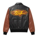 Back view of a black and brown Looney Tunes Tasmanian Devil leather jacket showing a yellow stylized Taz logo patch.