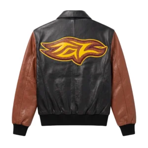 Back view of a black and brown Looney Tunes Tasmanian Devil leather jacket showing a yellow stylized Taz logo patch.