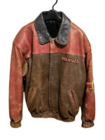 A Snoopy Cartoon Leather Jacket with collar, "PEANUTS" text on the left chest, and front pockets.