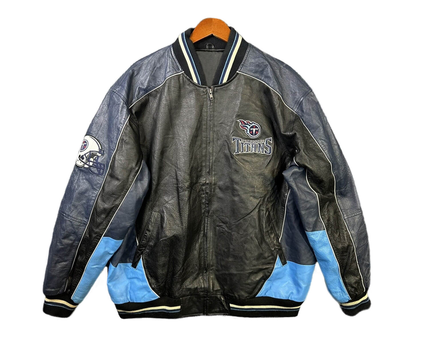 NFL-Football-Team-Tennessee-Titans-Leather-Jacket-1 Front view of Tennessee Titans NFL leather jacket featuring team logo on chest, black and blue color design, rib-knit collar and cuffs, and side waist pockets.