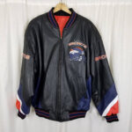 Vintage Denver Broncos leather bomber jacket featuring embroidered team logo on chest, "BRONCOS" text on sleeves.