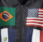 chest view of zipper closure & multi flags