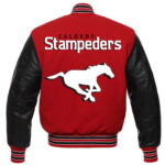Back view of red and black Calgary Stampeders varsity jacket featuring bold team spell-out and large logo design.