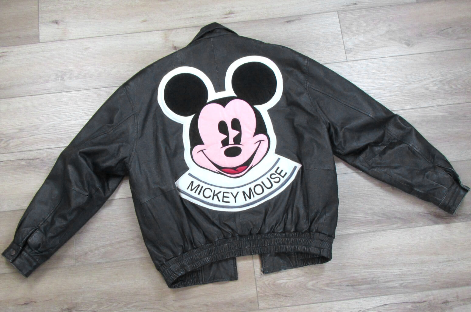 Vintage-Disney-Mickey-Mouse-Co-Too-Cute-Leather-Jacket-1 Disney Mickey Mouse leather jacket with large pink and black Mickey Mouse face patch and “Mickey Mouse” text on back
