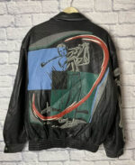 “Back view of Limited Edition Jeff Hamilton black leather Vintage Golf Jacket featuring elastic waistband and premium leather finish”