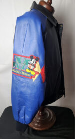 Vintage Mickey Mouse Disney leather jacket right side featuring Mickey Mouse cartoon patch with spell design