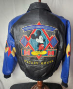 Black and blue Disney vintage Mickey Mouse leather jacket back with bold MM Mickey Mouse cartoon graphic