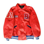 Vintage Buffalo Bills red leather varsity jacket front with B logo on chest, American flag patch, and snap-button closure.