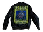 Looney Tunes Taz Wanted Dead or Alive black leather jacket back with Taz cartoon and Spanish wanted spell graphic