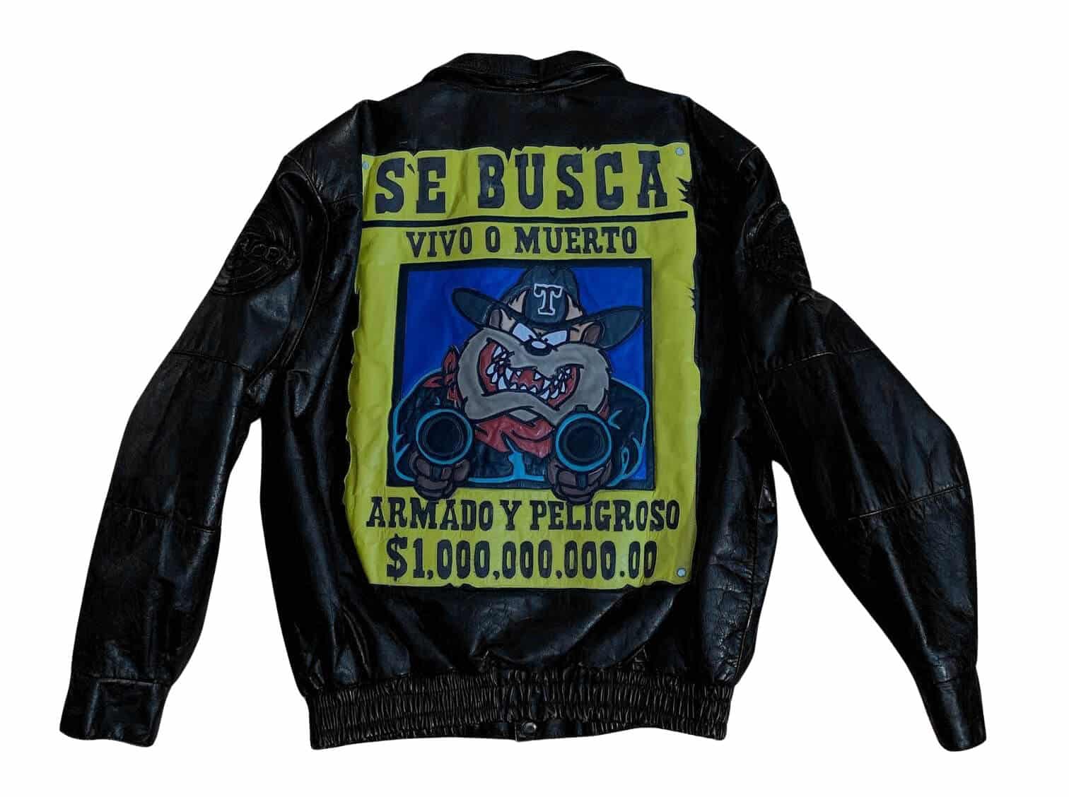 Looney-Tunes-Taz-Wanted-Dead-or-Alive-Leather-Jacket-1 Looney Tunes Taz Wanted Dead or Alive black leather jacket back with Taz cartoon and Spanish wanted spell graphic